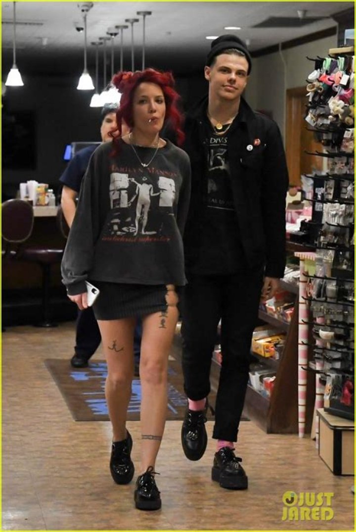 Halsey and Yungblud walking with determination