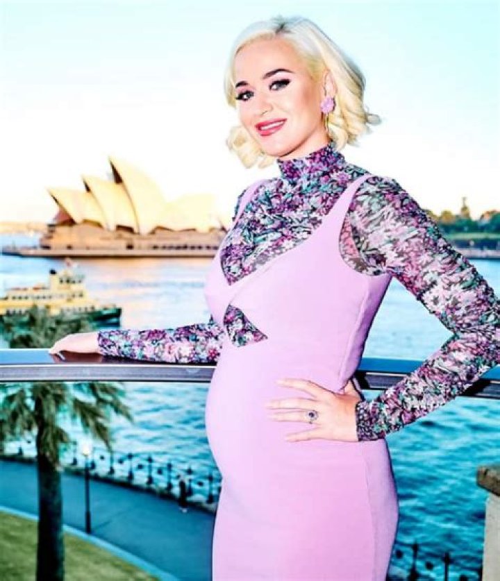 Heavily pregnant Katy Perry wears pepper spray around her neck