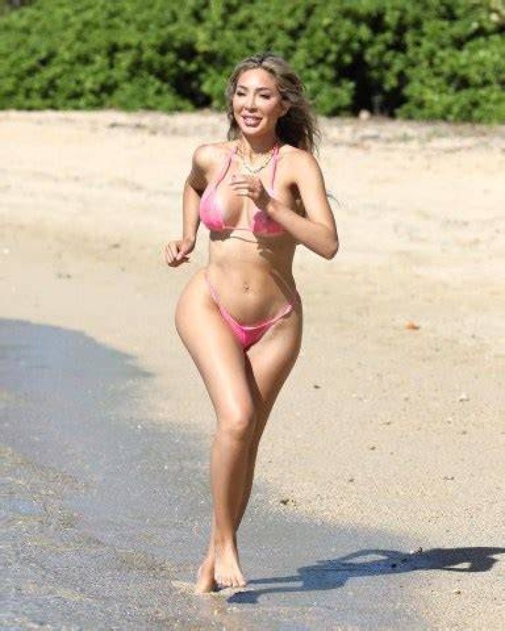 Honolulu, HI - *EXCLUSIVE* - Farrah Abraham shows off her curves during a birthday vacation to Hawaii. The Teen Mom looked great in a tiny bikini as she frolicked in the ocean. Pictured: Farrah Abraham BACKGRID USA 5 JUNE 2022 BYLINE MUST READ: BACKGRID USA: +1 310 798 9111 / UK: +44 208 344 2007 / *UK Clients - Pictures Containing Children Please Pixelate Face Prior To Publication*