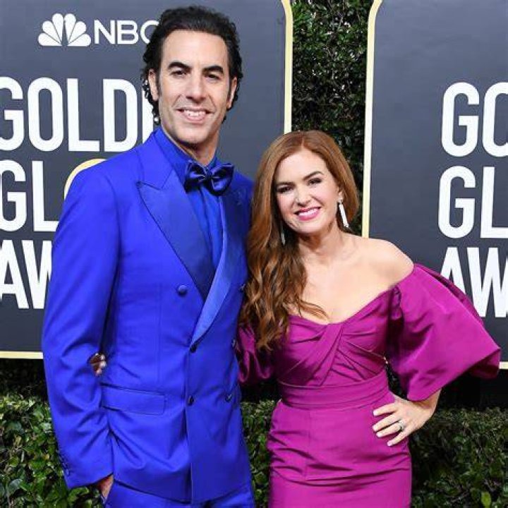 Isla Fisher, Sacha Baron Cohen. Isla Fisher, left, and Sacha Baron Cohen attend the 2019 Primetime Emmy Awards - Showtime Emmy Eve party at the San Vicente Bungalows, in West Hollywood, Calif 2019 Primetime Emmy Awards - Showtime Emmy Eve Party, West Hollywood, USA - 21 Sep 2019