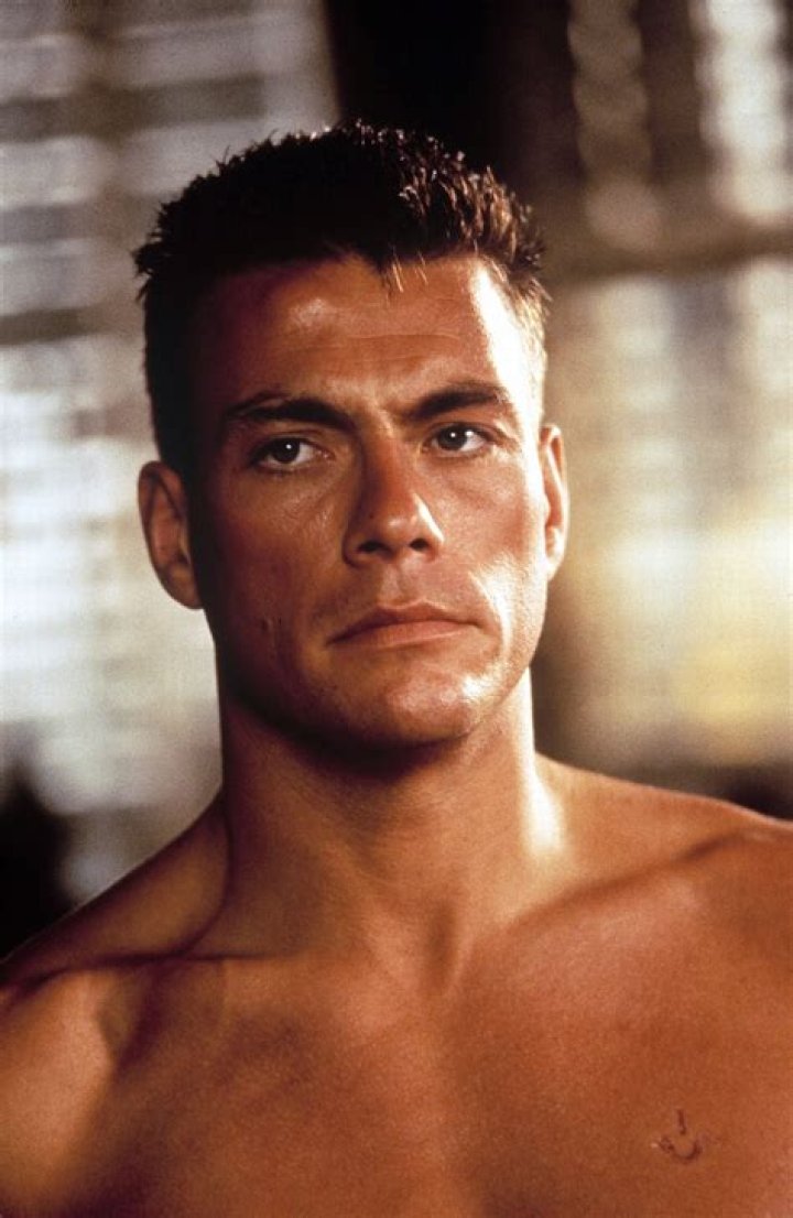 Jean-Claude Van Damme Cuddles a Puppy