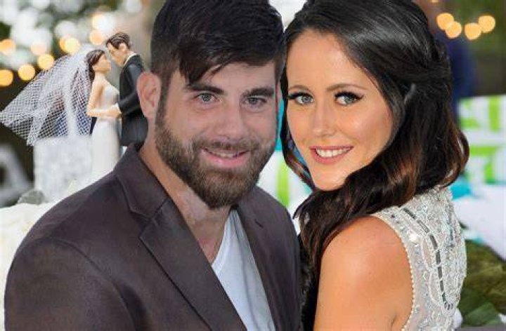 Jenelle Evans with her husband David Eason towering over her