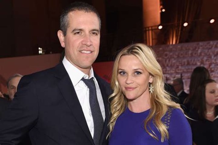 Jim Toth, Reese Witherspoon. Jim Toth, left, and Reese Witherspoon pose in the audience at the 69th Primetime Emmy Awards, at the Microsoft Theater in Los Angeles 69th Primetime Emmy Awards - Audience, Los Angeles, USA - 17 Sep 2017