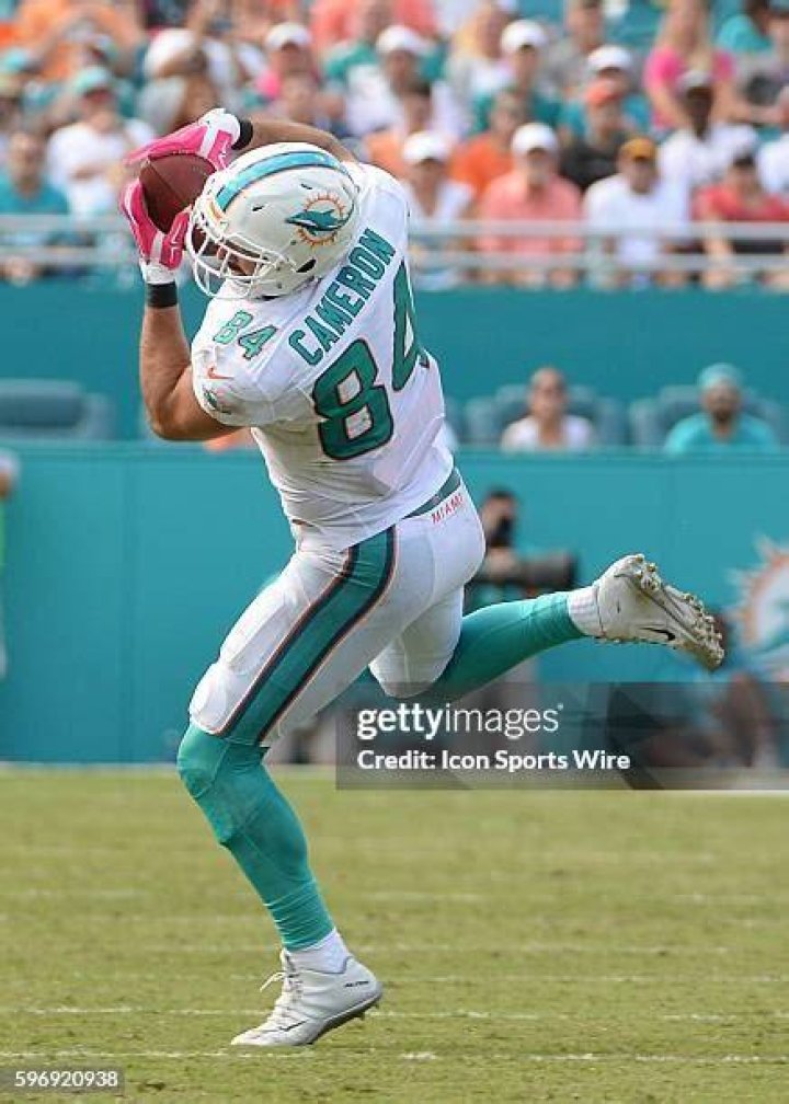 Jordan Cameron Miami Dolphins tight end Jordan Cameron (84) walks the sidelines during the second half of an NFL football game against the Buffalo Bills, in Miami Gardens, Fla Bills Dolphins Football, Miami Gardens, USA