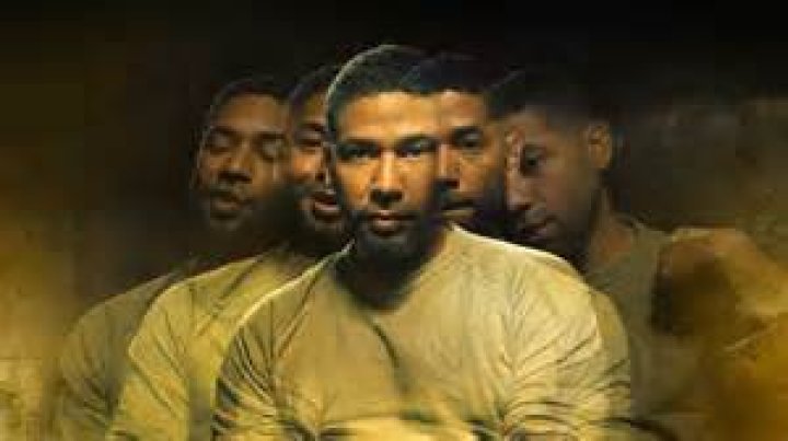 Jussie Smollett poses with fans