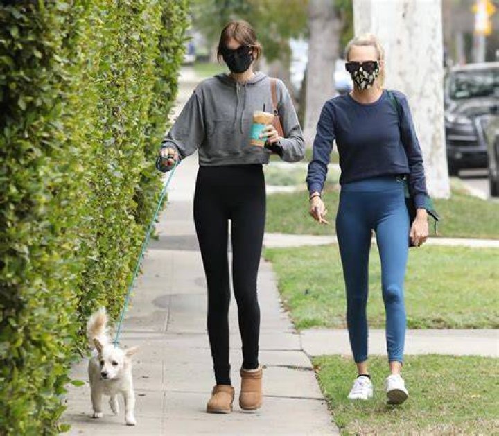 Kaia Gerber & Cara Delevingne walking