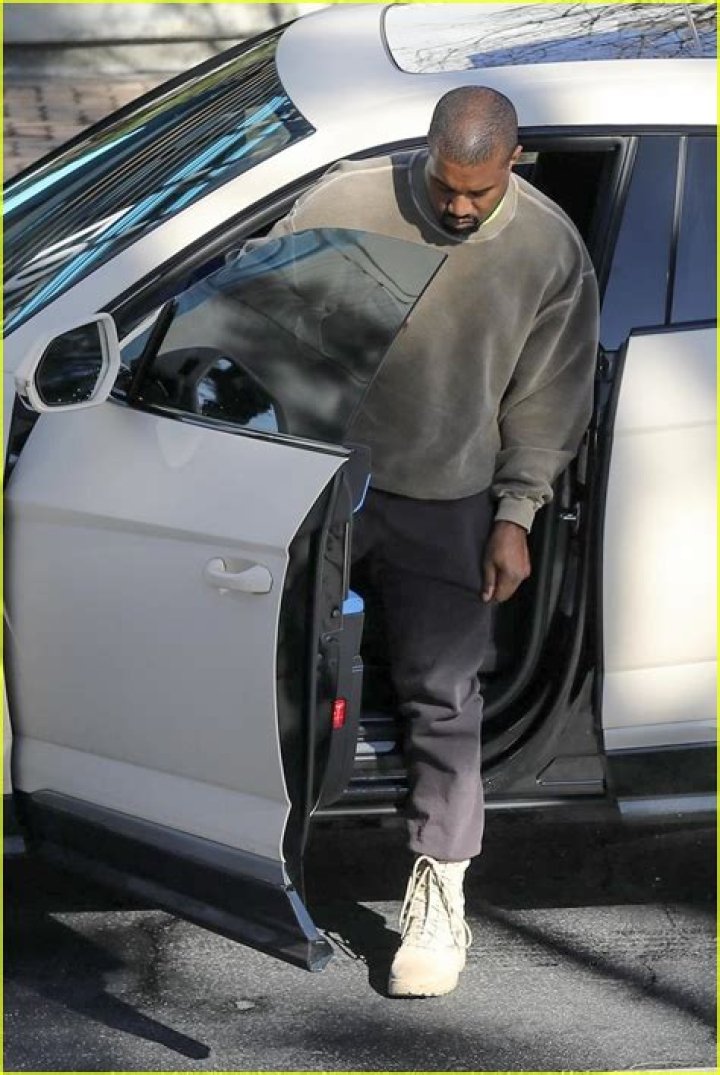 Kanye West heads to a meeting in Sherman Oaks after church. Kanye was seen wearing an oversized American flag bomber jacket. 27 Nov 2022 Pictured: Kanye West. Photo credit: @CelebCandidly/ Snorlax / MEGA TheMegaAgency.com +1 888 505 6342 (Mega Agency TagID: MEGA921309_001.jpg) [Photo via Mega Agency]