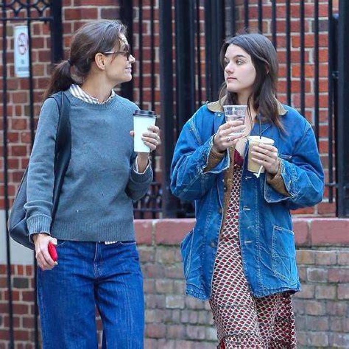 Katie Holmes & Suri Cruise sitting together