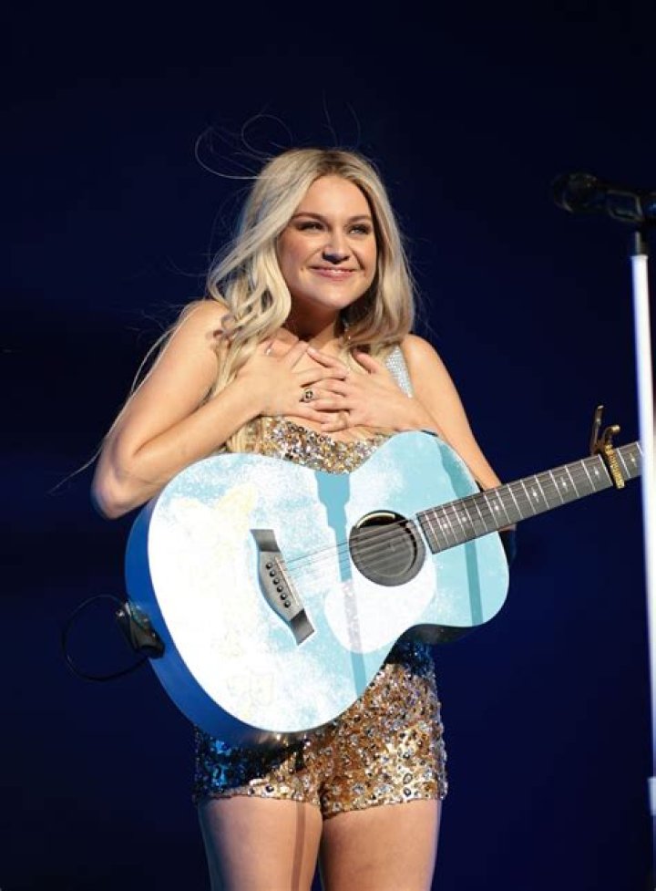 Kelsea Ballerini Performs in a Black Tie-Themed Mini Skirt