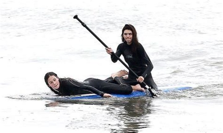 Kendall Jenner going paddle boarding in a white swimsuit Cannes,may 24 th 2017. 24 May 2017 Pictured: Kendall jenner. Photo credit: KCS Presse / MEGA TheMegaAgency.com +1 888 505 6342 (Mega Agency TagID: MEGA37822_002.jpg) [Photo via Mega Agency]