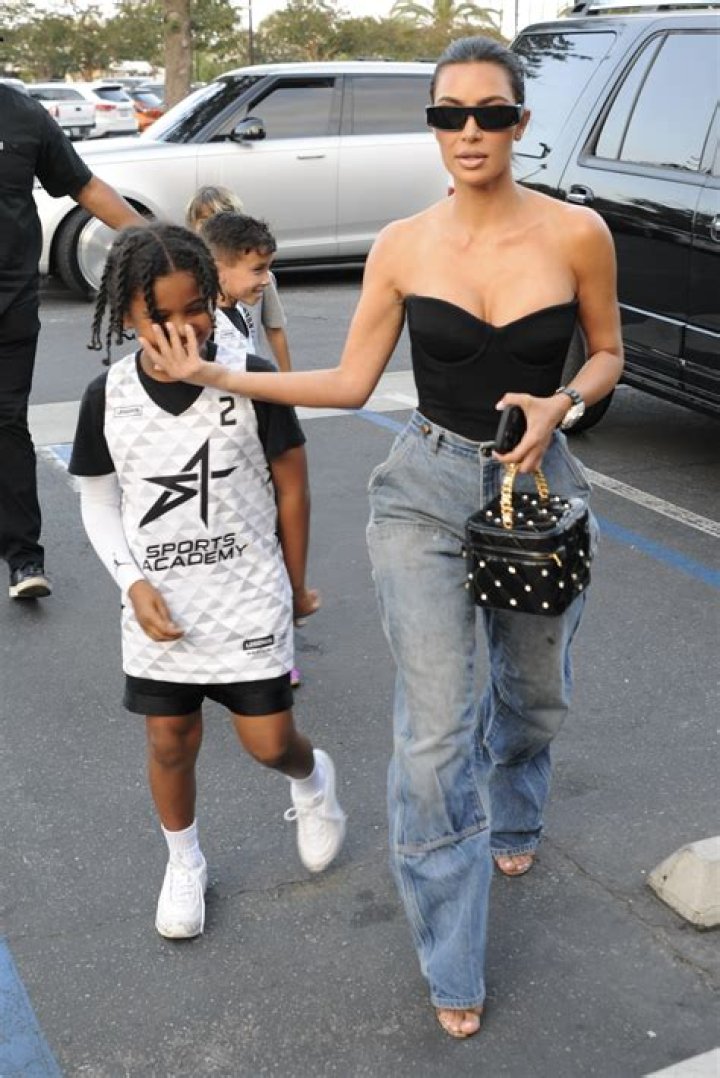 Kim Kardashian Carrying Saint West