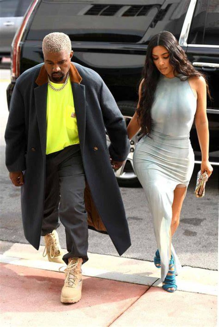Kim Kardashian & Kanye West holding hands