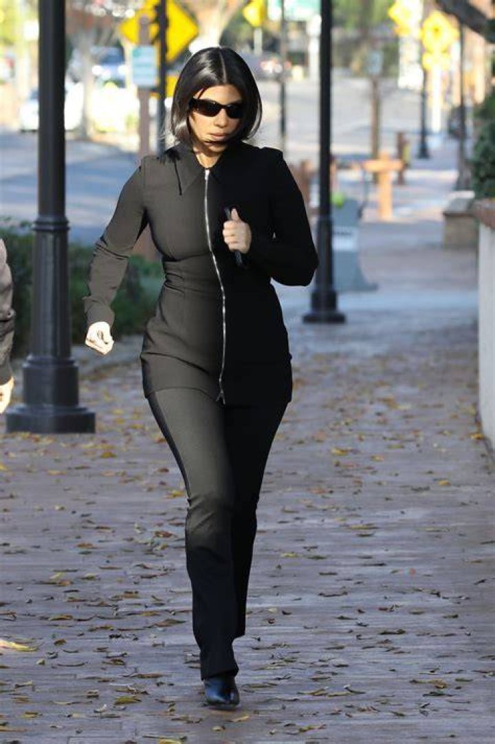 Kourtney Kardashian In A Black Swimsuit
