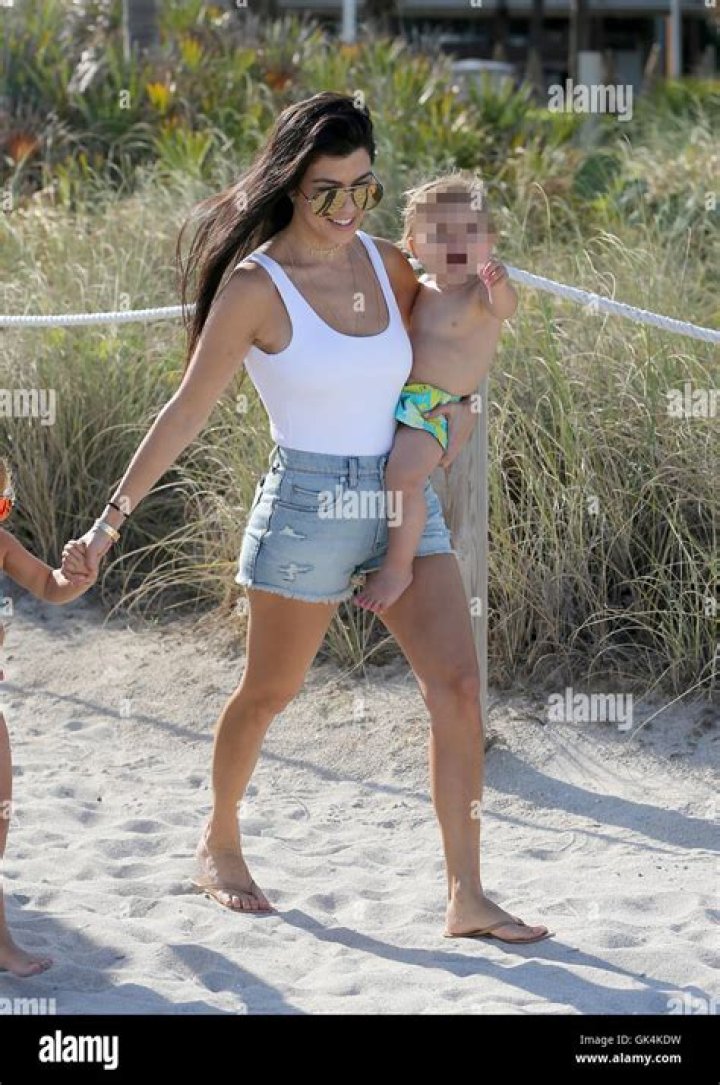 Kourtney Kardashian In A White Swimsuit