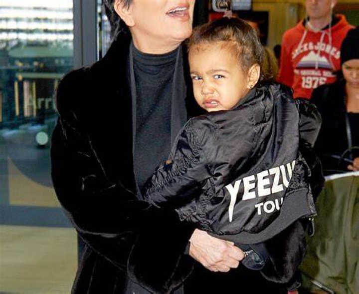Kris Jenner holds North West