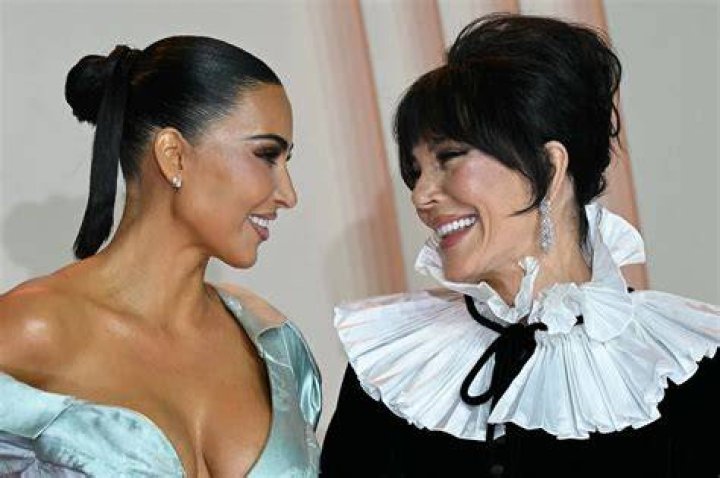 Kris Jenner poses with Kim Kardashian