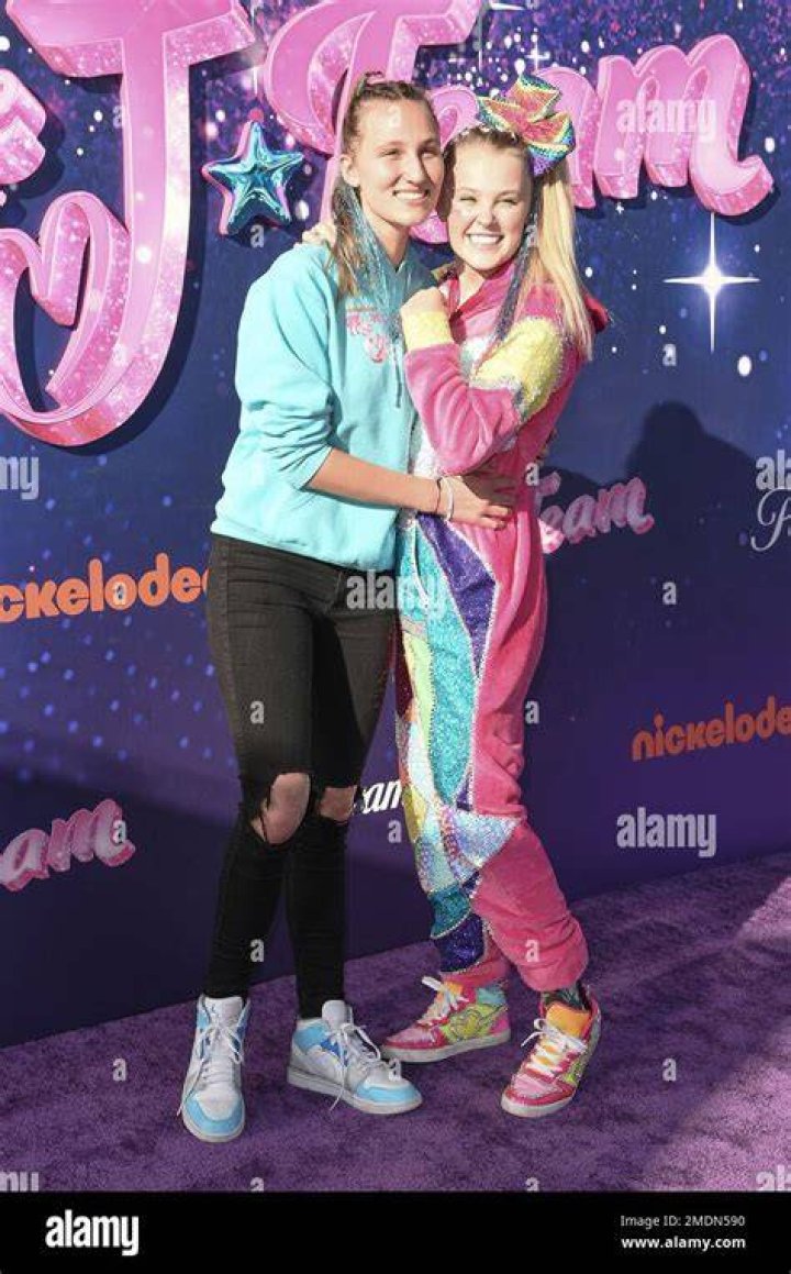 Kylie Prew, left, and JoJo Siwa arrive at the drive-in premiere of JoJo Siwa's "The J Team", at the Rose Bowl in Pasadena, Calif JoJo Siwa's "The J Team" Drive-In Premiere, Pasadena, United States - 03 Sep 2021