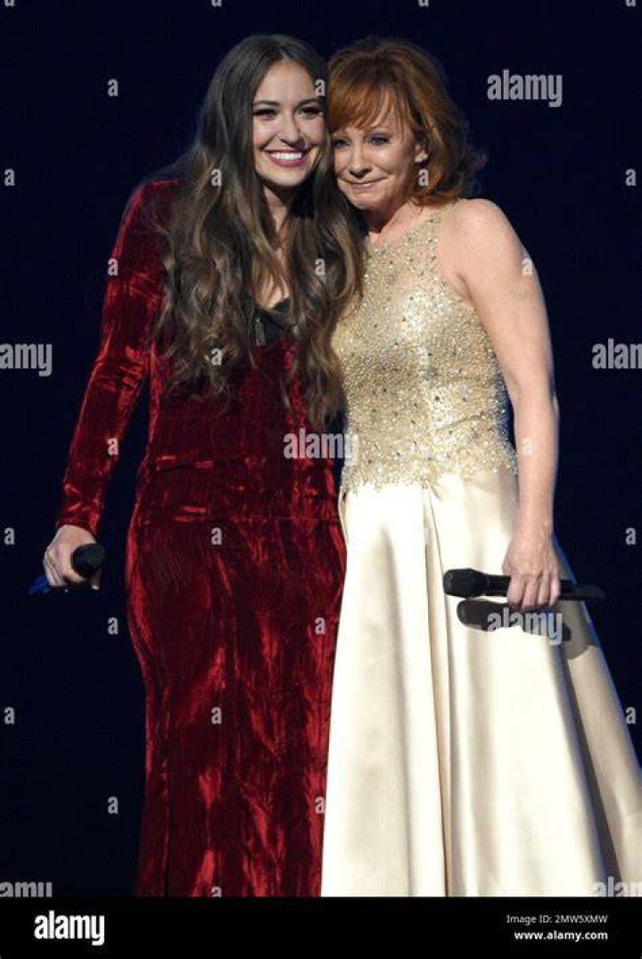 Lauren Daigle, left, and Reba McEntire perform "Back to God" at the 52nd annual Academy of Country Music Awards at the T-Mobile Arena, in Las Vegas 52nd Annual Academy Of Country Music Awards - Show, Las Vegas, USA - 2 Apr 2017