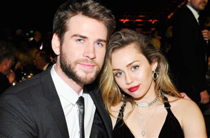 Liam Hemsworth Miley Cyrus Postpone Wedding