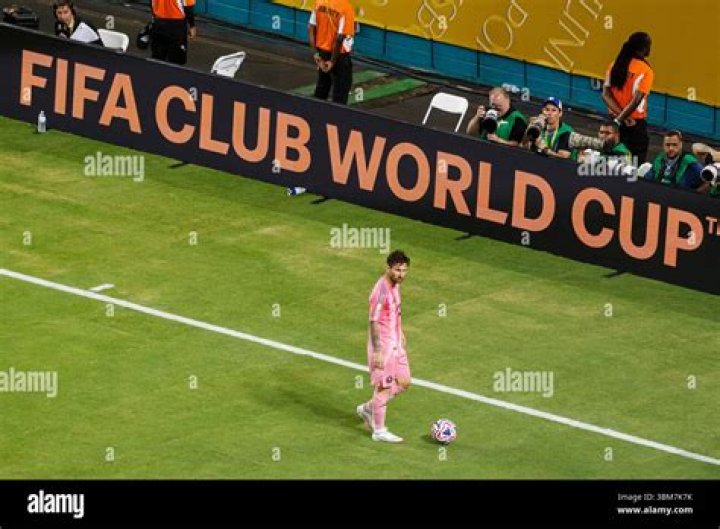 Lionel Messi walks by a crowd