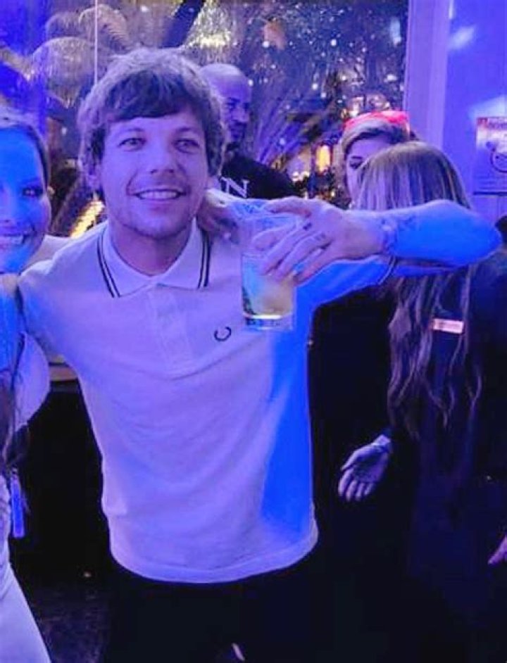 louis tomlinson partying