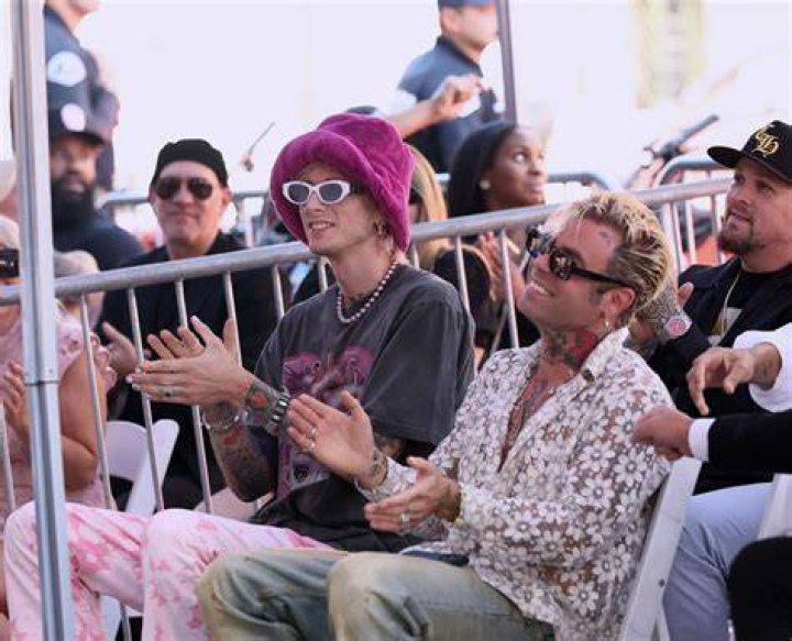 Machine Gun Kelly and Mod Sun protesting