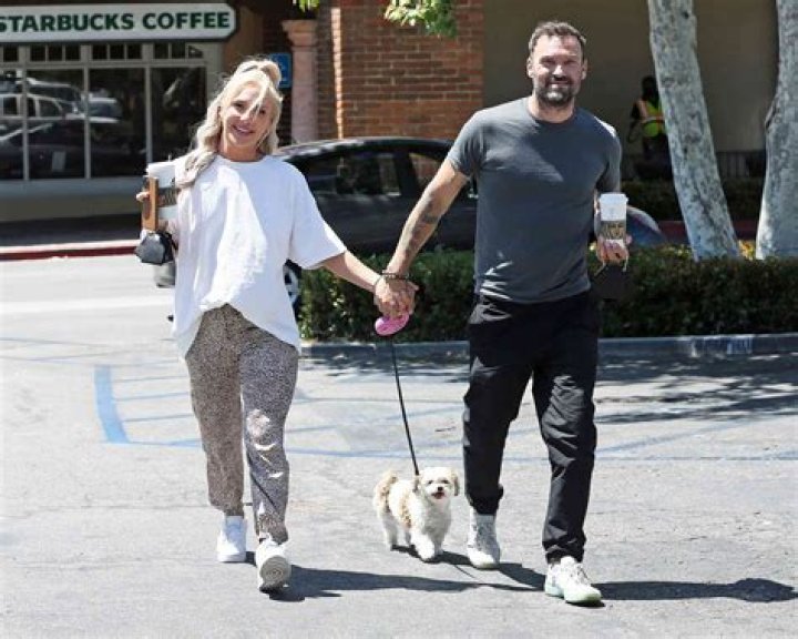 Malibu, C - *EXCLUSIVE* - Brian Austin Green and Sharna Burgess are expecting their baby real soon and the couple can't seem to keep their hands (and lips) off each other. The lovebirds are out shopping at Sweet Bu Candy in Malibu and Sharna is showing off her huge bump meanwhile Brian leans over for a kiss during their walk. Pictured: Brian Austin Green, Sharna Burgess BACKGRID USA 16 MAY 2022 BYLINE MUST READ: RMBI / BACKGRID USA: +1 310 798 9111 / UK: +44 208 344 2007 / *UK Clients - Pictures Containing Children Please Pixelate Face Prior To Publication*