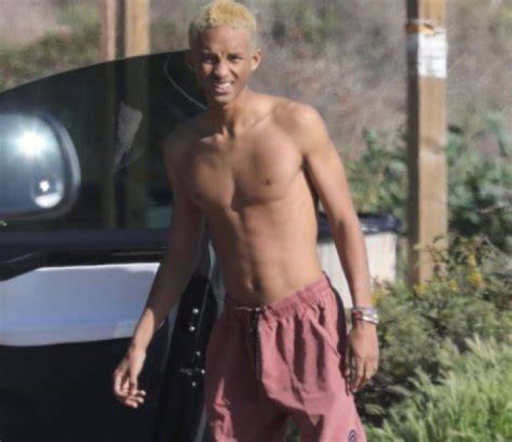 Malibu, CA - *EXCLUSIVE* - Jaden Smith takes a mystery blonde to the beach to watch him surf in Malibu despite recommendations to stay at home during the COVID-19 pandemic. Pictured: Jaden Smith BACKGRID USA 27 MARCH 2020 BYLINE MUST READ: Clint Brewer Photography / BACKGRID USA: +1 310 798 9111 / UK: +44 208 344 2007 / *UK Clients - Pictures Containing Children Please Pixelate Face Prior To Publication*