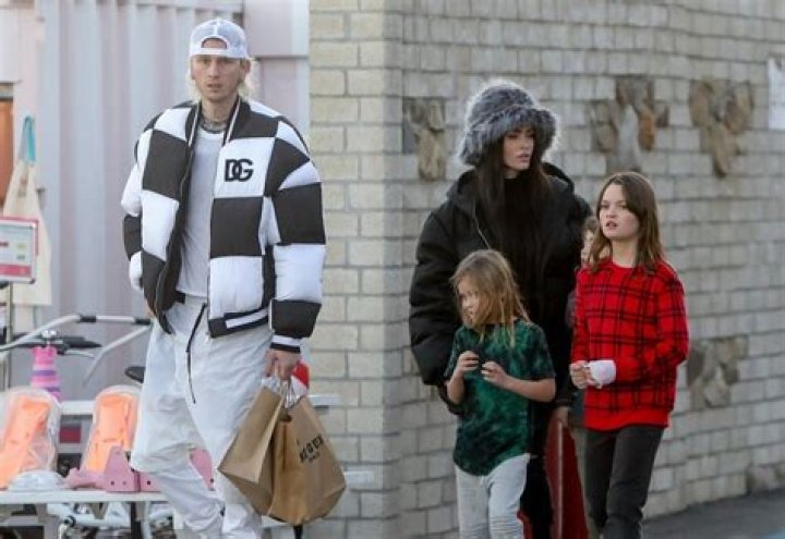 Malibu, CA - *EXCLUSIVE* - Megan Fox and Machine Gun pictured exiting NOBU Malibu with his daughter Casie after enjoying a fancy meal ahead of New Year's. Pictured: Megan Fox, Machine Gun, Casie Colson Baker BACKGRID USA 1 JANUARY 2022 BYLINE MUST READ: BACKGRID USA: +1 310 798 9111 / UK: +44 208 344 2007 / *UK Clients - Pictures Containing Children Please Pixelate Face Prior To Publication*