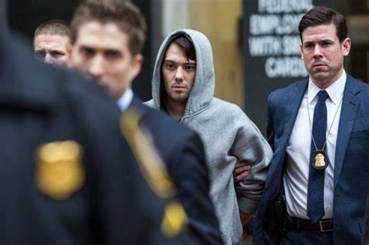 Martin Shkreli being escorted by law enforcement agents in New York