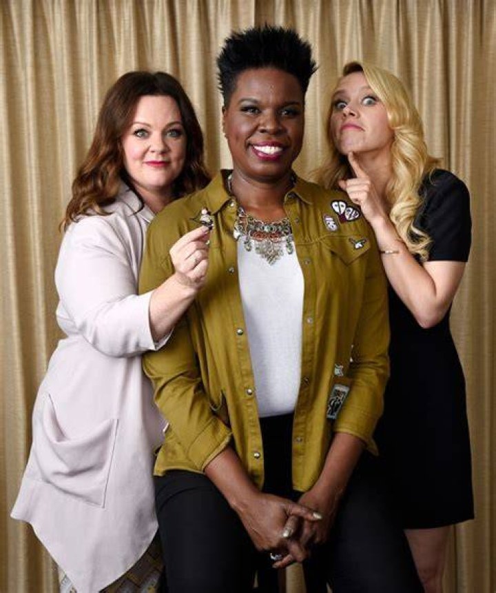 Melissa McCarthy, left, Leslie Jones, center, and Kate McKinnon, cast members in "Ghostbusters," pose with a Lego toy figure of fellow cast member Kristen Wiig during a portrait session at the Four Seasons Hotel in Los Angeles. Their film will be released on Friday "Ghostbusters" Portrait Session, Los Angeles, USA