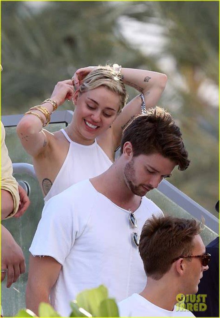 Miley Cyrus and Patrick Schwarzenegger sighting at USC football game