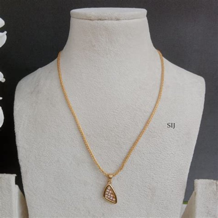 Mini Mini Jewels Triangle Pendant ($234.99, Mini Mini Jewels)