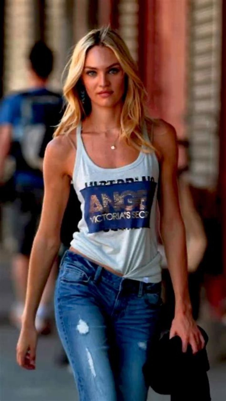 Model Candice Swanepoel is spotted at the beach in Miami Beach, Florida. Candice wore a 'C bralette' bikini top in surfer stripe colors from her own bikini line, tropicofc. She combined it with a green and red skirt. Pictured: Candice Swanepoel Ref: SPL5486718 180922 NON-EXCLUSIVE Picture by: Pichichipixx / SplashNews.com Splash News and Pictures USA: +1 310-525-5808 London: +44 (0)20 8126 1009 Berlin: +49 175 3764 166 World Rights