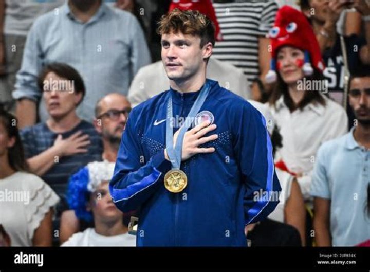 NANTERRE, FRANCE - AUGUST 03: Gold Medalist Katie Ledecky of Team United States poses on the podium during the Swimming medal ceremony after the Women's 800m Freestyle Final on day eight of the Olympic Games Paris 2024 at Paris La Defense Arena on August 03, 2024 in Nanterre, France. (Photo by Quinn Rooney/Getty Images)