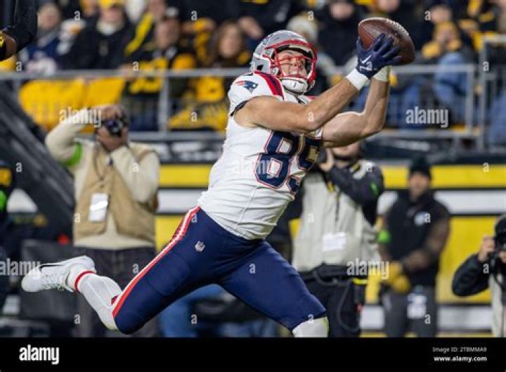 New England Patriots tight end Aaron Hernandez walks to the bench in the second quarter of an NFL football game between the Patriots and the Tennessee Titans, in Nashville, Tenn Patriots Titans Football, Nashville, USA - 9 Sep 2012