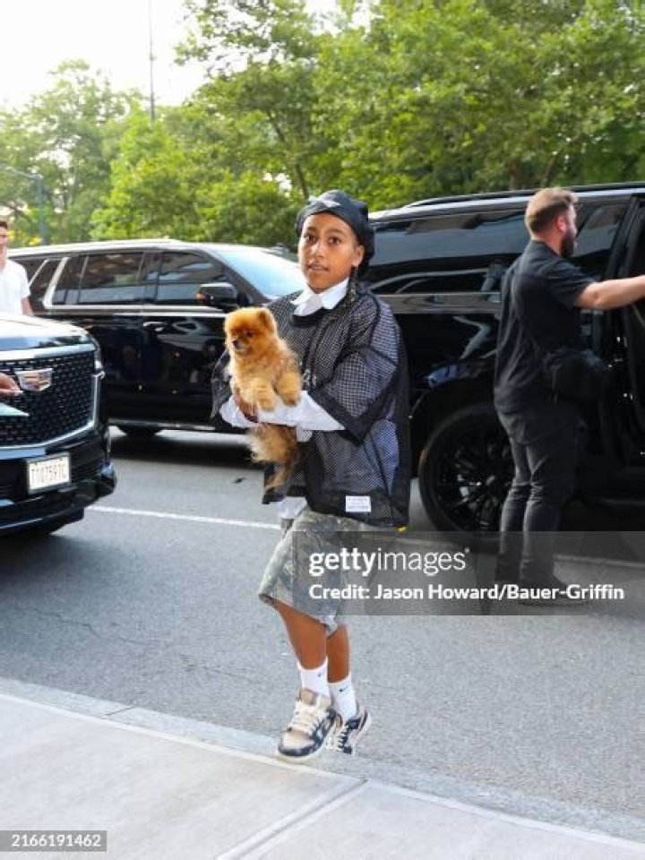 New York, NY - North West, Penelope & Scott Disick step out in the rain in NYC all dressed in Chanel. Pictured: Scott Disick, North West, Penelope Disick BACKGRID USA 30 APRIL 2023 USA: +1 310 798 9111 / UK: +44 208 344 2007 / *UK Clients - Pictures Containing Children Please Pixelate Face Prior To Publication*