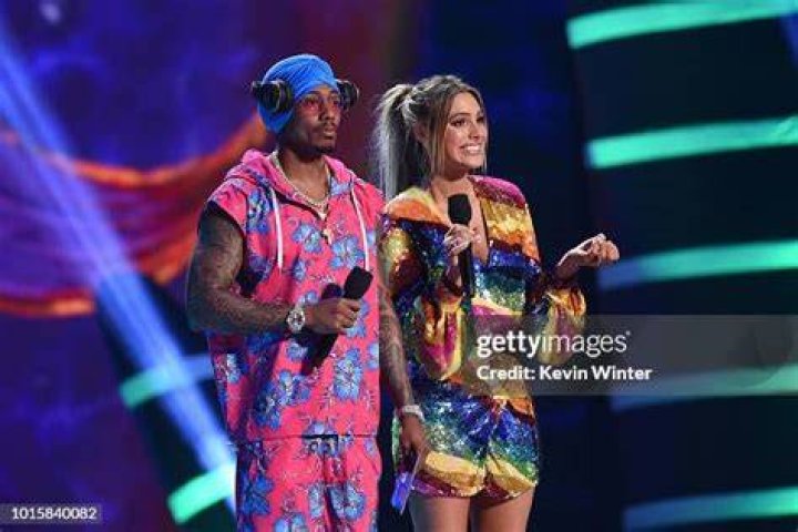 Nick Cannon, Lele Pons, Diego Tinoco, Jason Genao, Brett Gray, Sierra Capri. Hosts Nick Cannon, left, and Lele Pons, right, present the award for choice breakout TV for the show to, from second left, Diego Tinoco, Jason Genao, Brett Gray and Sierra Capri for "On My Block" at the Teen Choice Awards at The Forum, in Inglewood, Calif2018 Teen Choice Awards - Show, Inglewood, USA - 12 Aug 2018