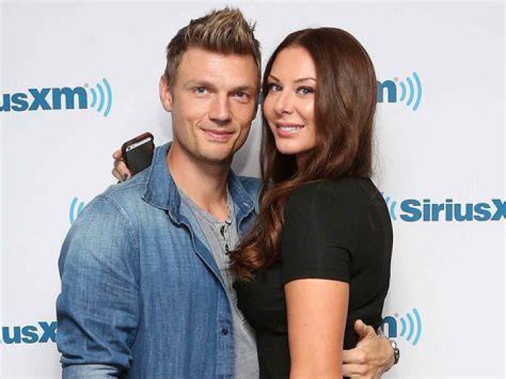 Nick Carter, left, and Lauren Kitt arrive at the Backstreet Boys: Show &acirc;?&tilde;Em What You're Made Of premiere at the Arclight Cinemas - Cinerama Dome, in Los Angeles LA Premiere of "Backstreet Boys: Show 'Em What Your Made Of", Los Angeles, USA