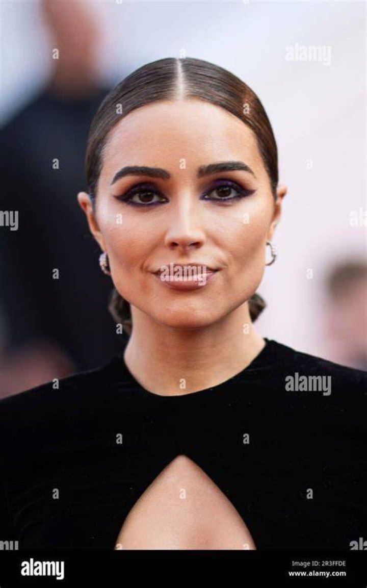 Olivia Culpo poses for a photo with Christian McCaffrey on the red carpet for the Sports Illustrated's "The Party" presented by Captain Morgan in Scottsdale, Arizona on Saturday, February 11, 2023. SI Super Bowl Party, Scottsdale, Arizona, United States - 12 Feb 2023