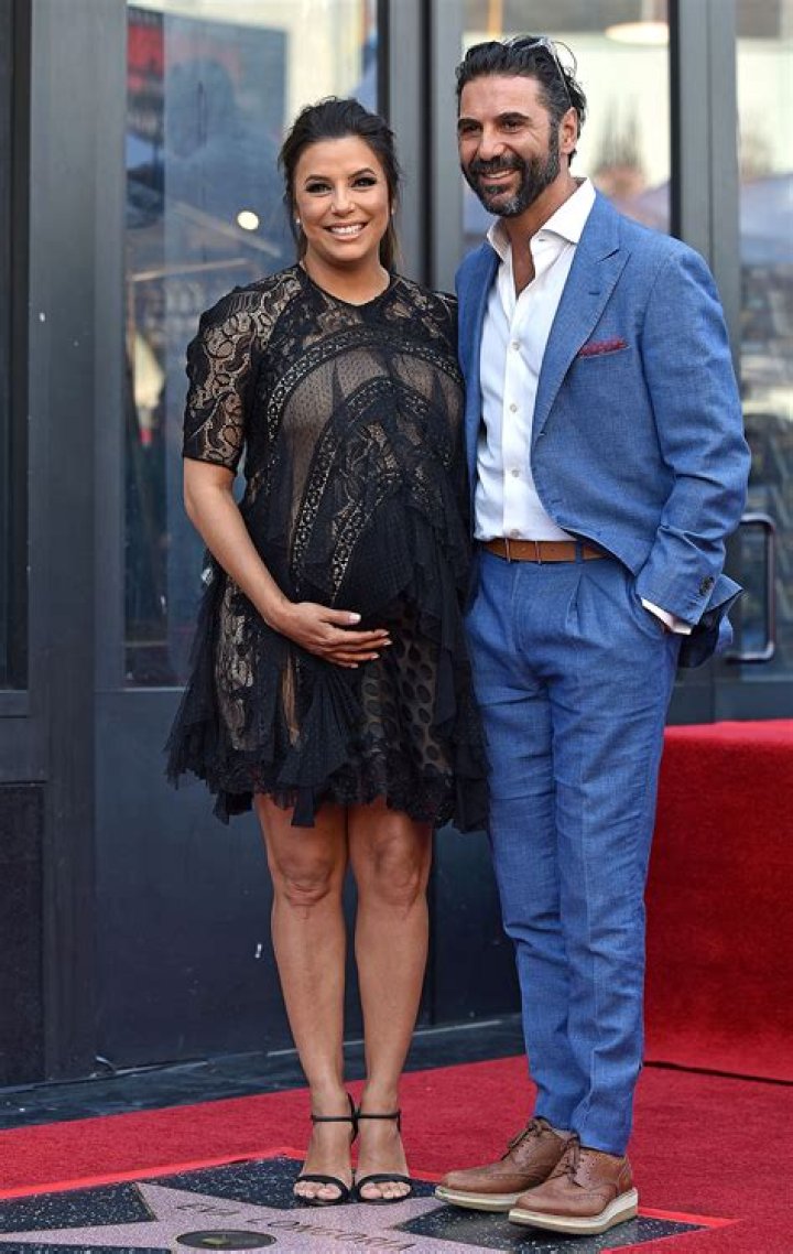 Pregnant Eva Longoria with husband Jose Baston