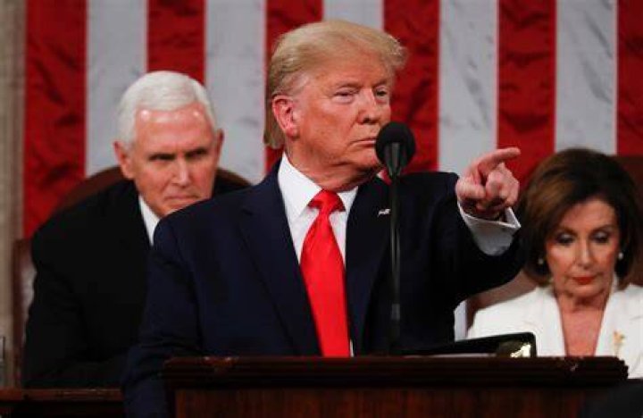 President Donald Trump delivers his State of the Union address to a joint session of Congress on Capitol Hill in Washington, Tuesday, Feb. 4, 2020, as Vice President Mike Pence and House Speaker Nancy Pelosi, D-Calif., watch. (AP Photo/Patrick Semansky)