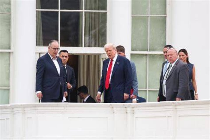 President Donald Trump walks out to pardon the national Thanksgiving turkey, in the Rose Garden of the White House, Tuesday, Nov. 24, 2020, in Washington, with first lady Melania Trump. (AP Photo/Susan Walsh)