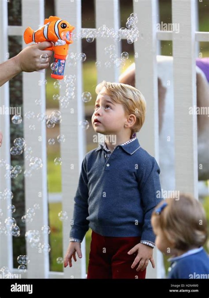Prince George plays with bubbles