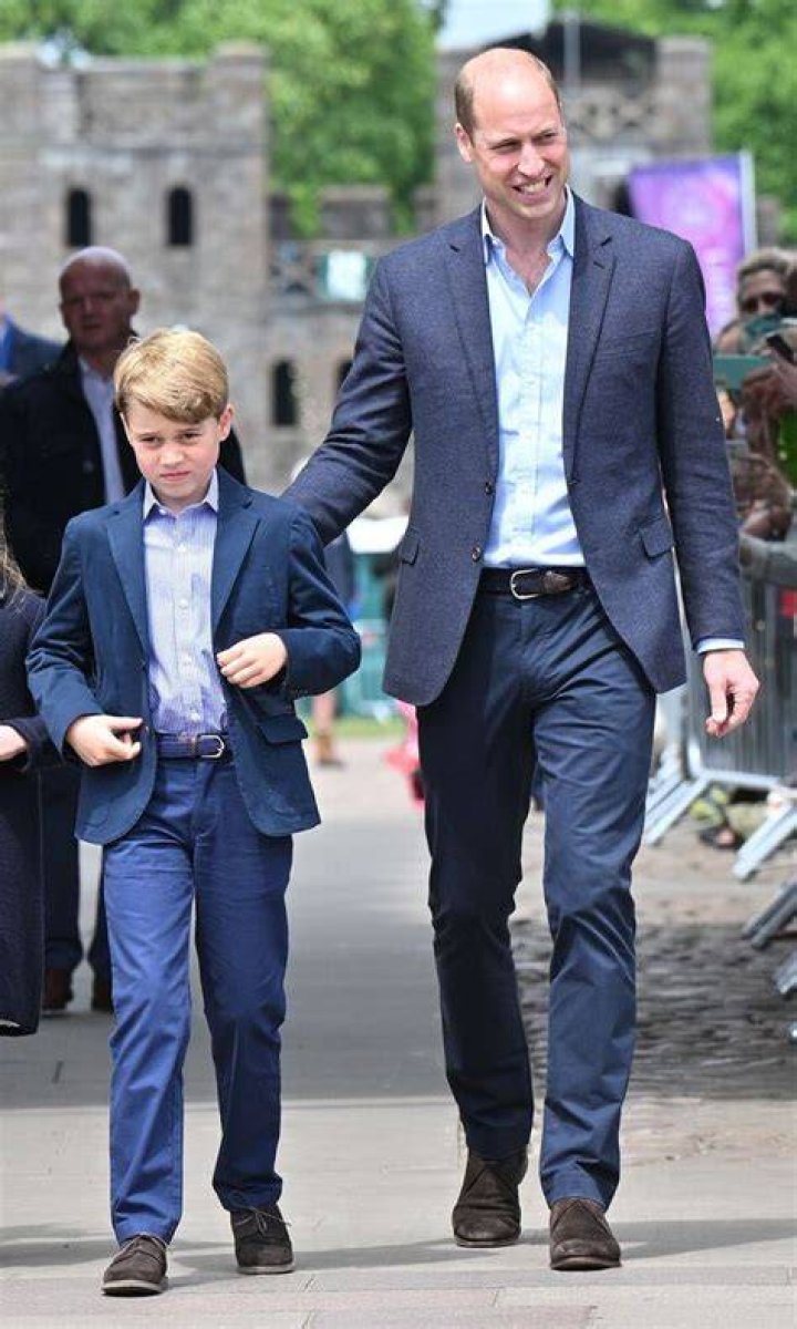 Prince George walking on the grass