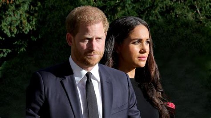 Prince Harry & Meghan Markle say hi to the crowd