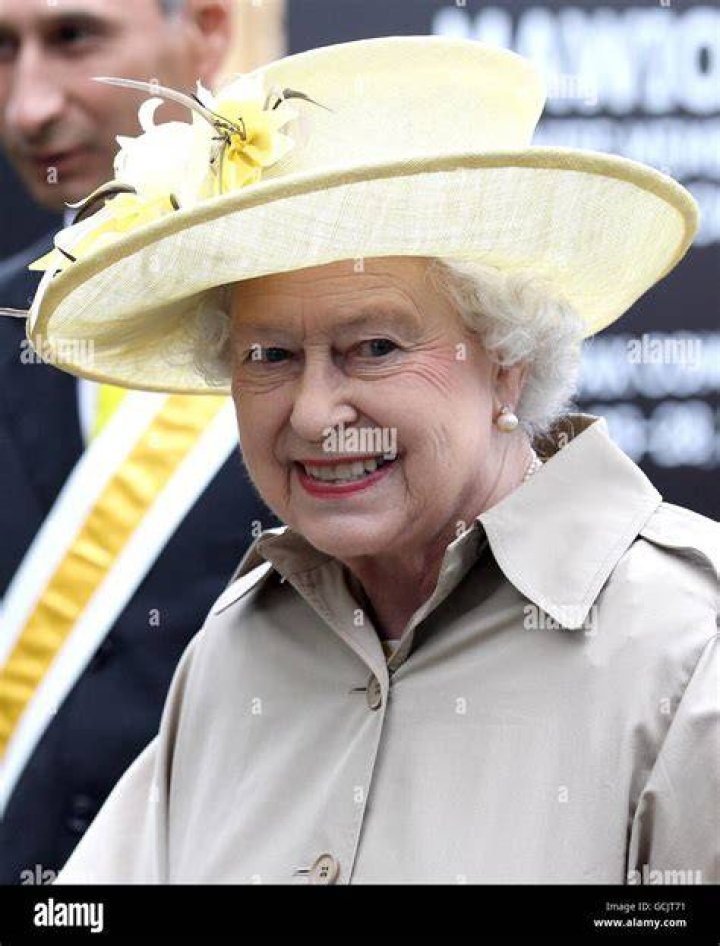 Queen Elizabeth II Smiles At Prince Philip