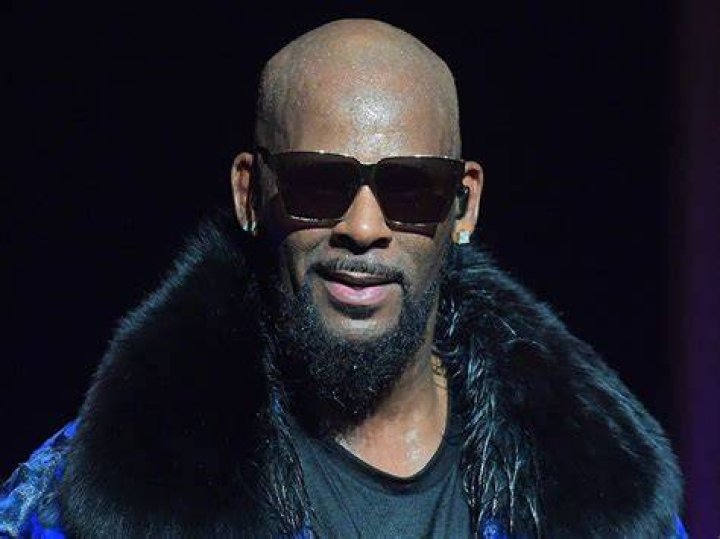 R&B singer R. Kelly, center, arrives at the Leighton Criminal Court building for an arraignment on sex-related felonies in Chicago R Kelly, Chicago, USA - 26 Jun 2019