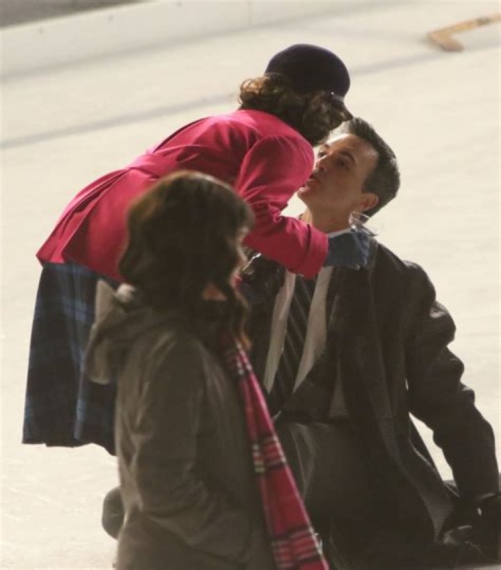 Rachel Brosnahan & Reid Scott Kiss