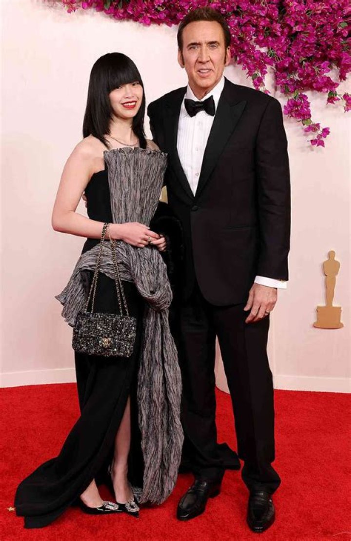 Riko Shibata, left, and Nicolas Cage arrive at the Los Angeles premiere of "Pig", at the Nuart Theatre Premiere of "Pig", Los Angeles, United States - 13 Jul 2021